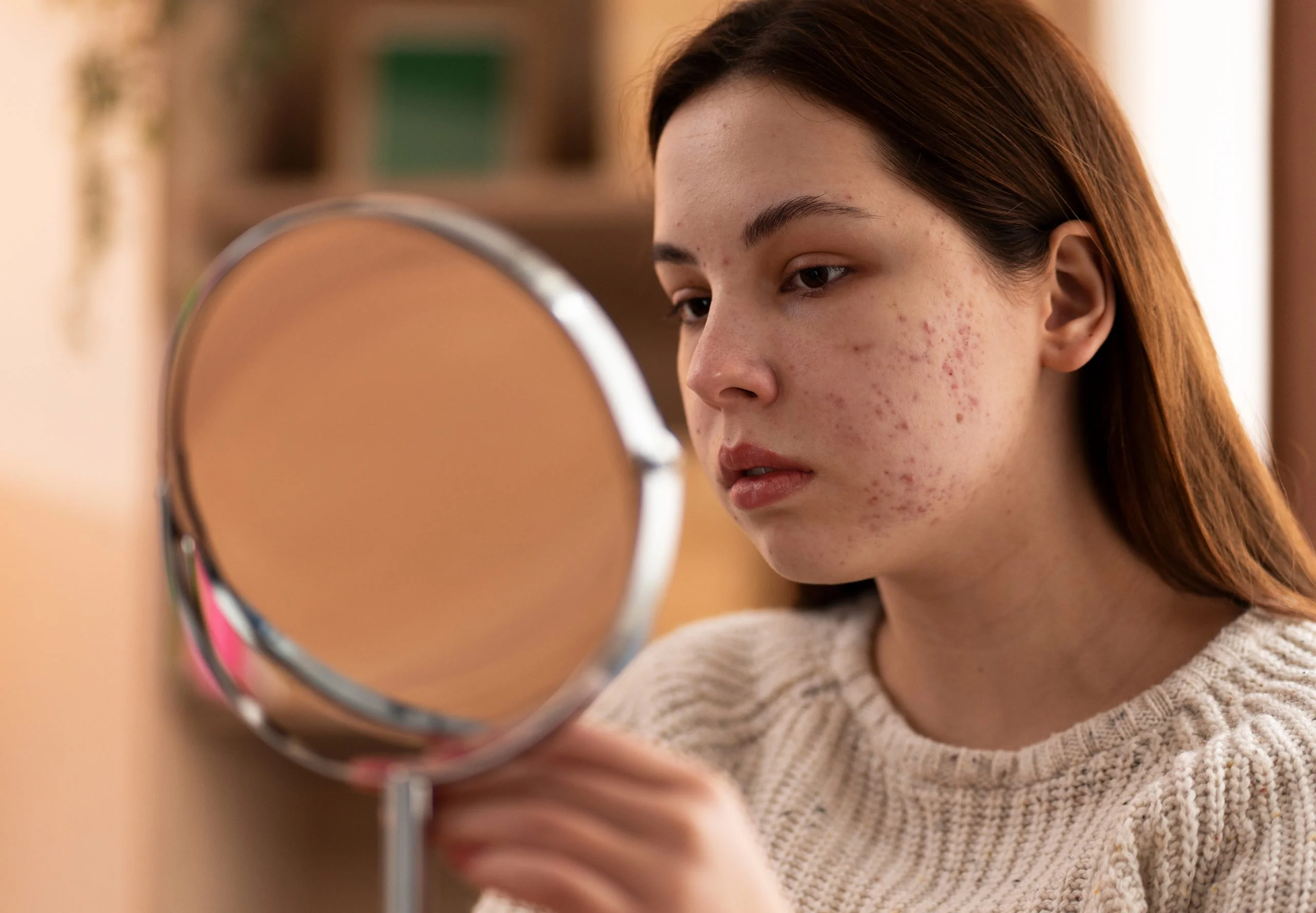 Calm skincare consultation moment — woman with healthy skin